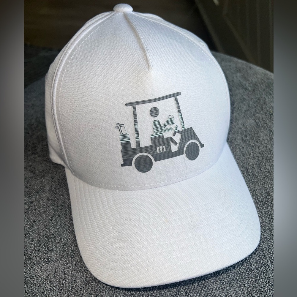New** never worn. Travis Matthew Golf Cart Cap - White